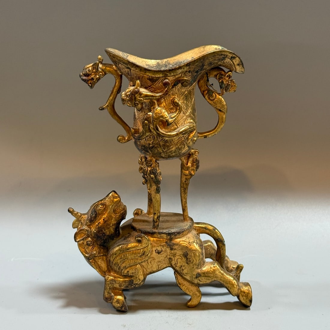 A beautiful bronze gilt dry pit auspicious beast cup (1 of 9)