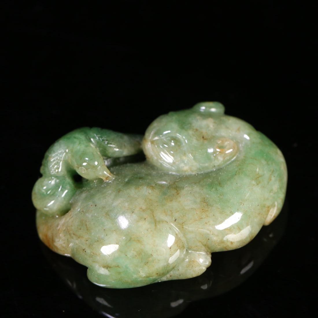 A finely crafted old jadeite auspicious beast carving (1 of 8)
