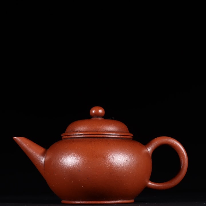 A finely crafted vermilion clay small horizontal Yixing teapot (1 of 9)