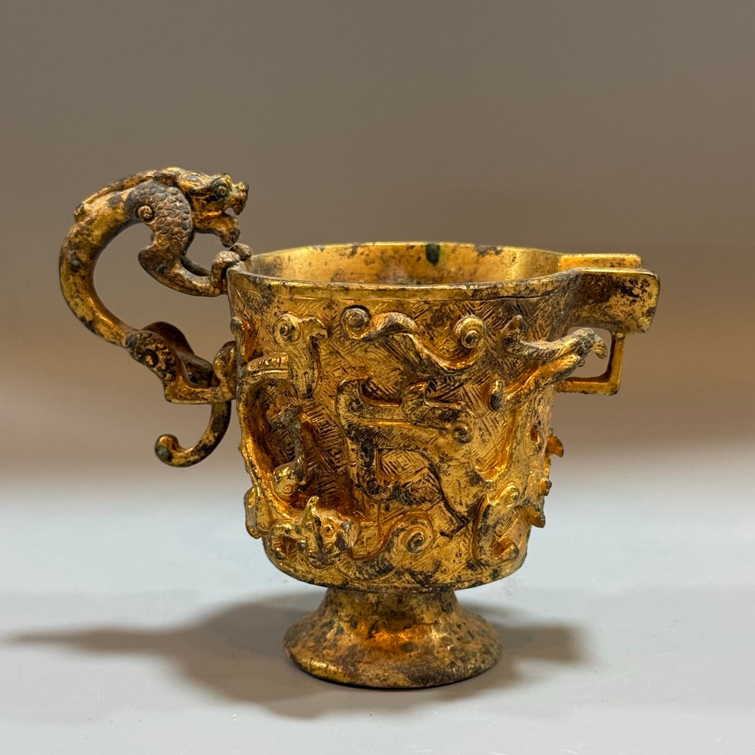 A finely crafted gilded copper dry pit golden goblet (1 of 8)