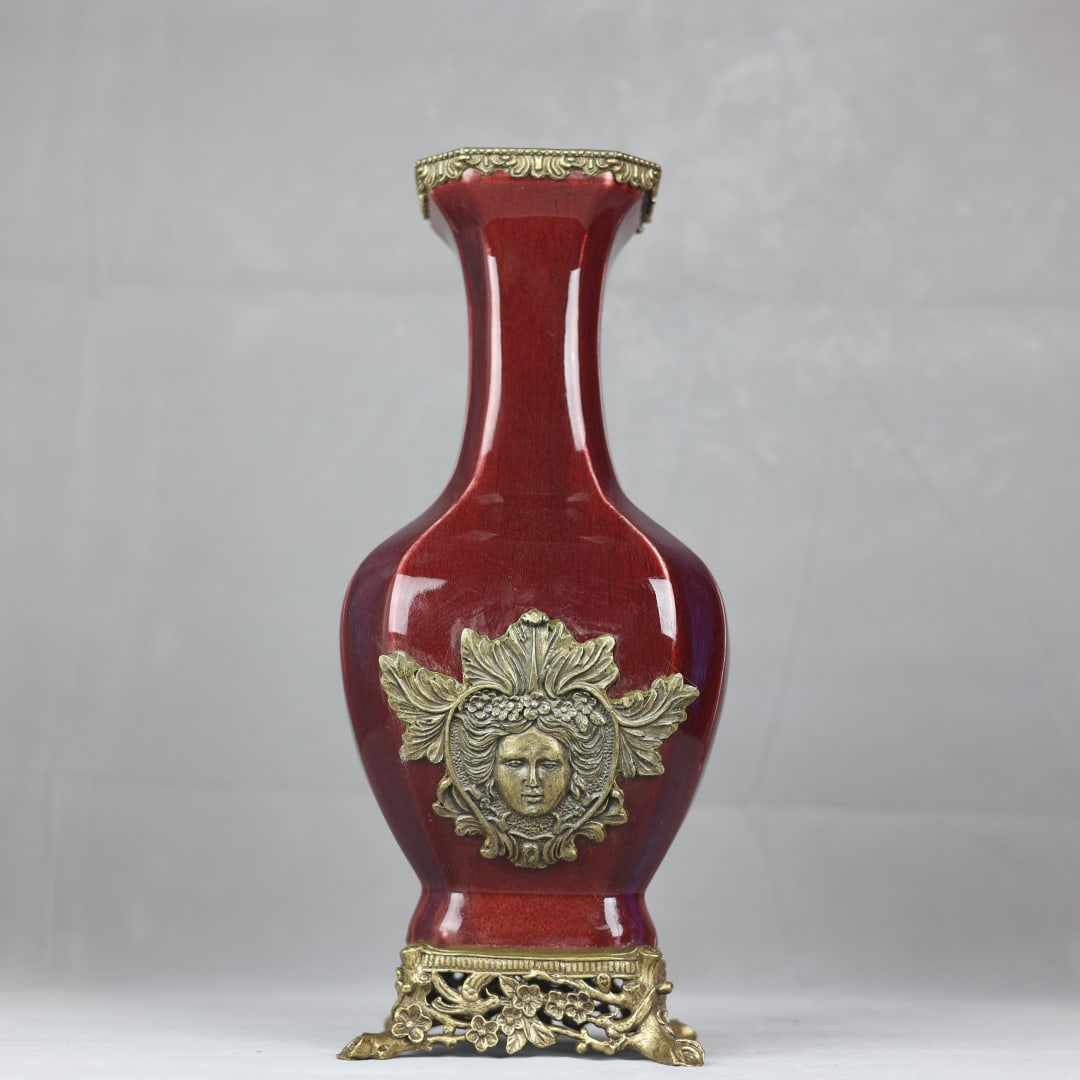 A fine red-glazed bronze vase with Western deity motifs inlaid on a copper square octagonal vase (1 of 9)