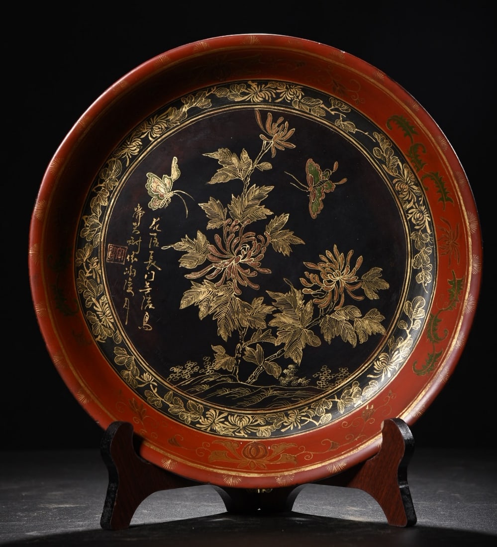 A fine wooden plate with large lacquer painted gold floral patterns inscribed with poetry (1 of 9)