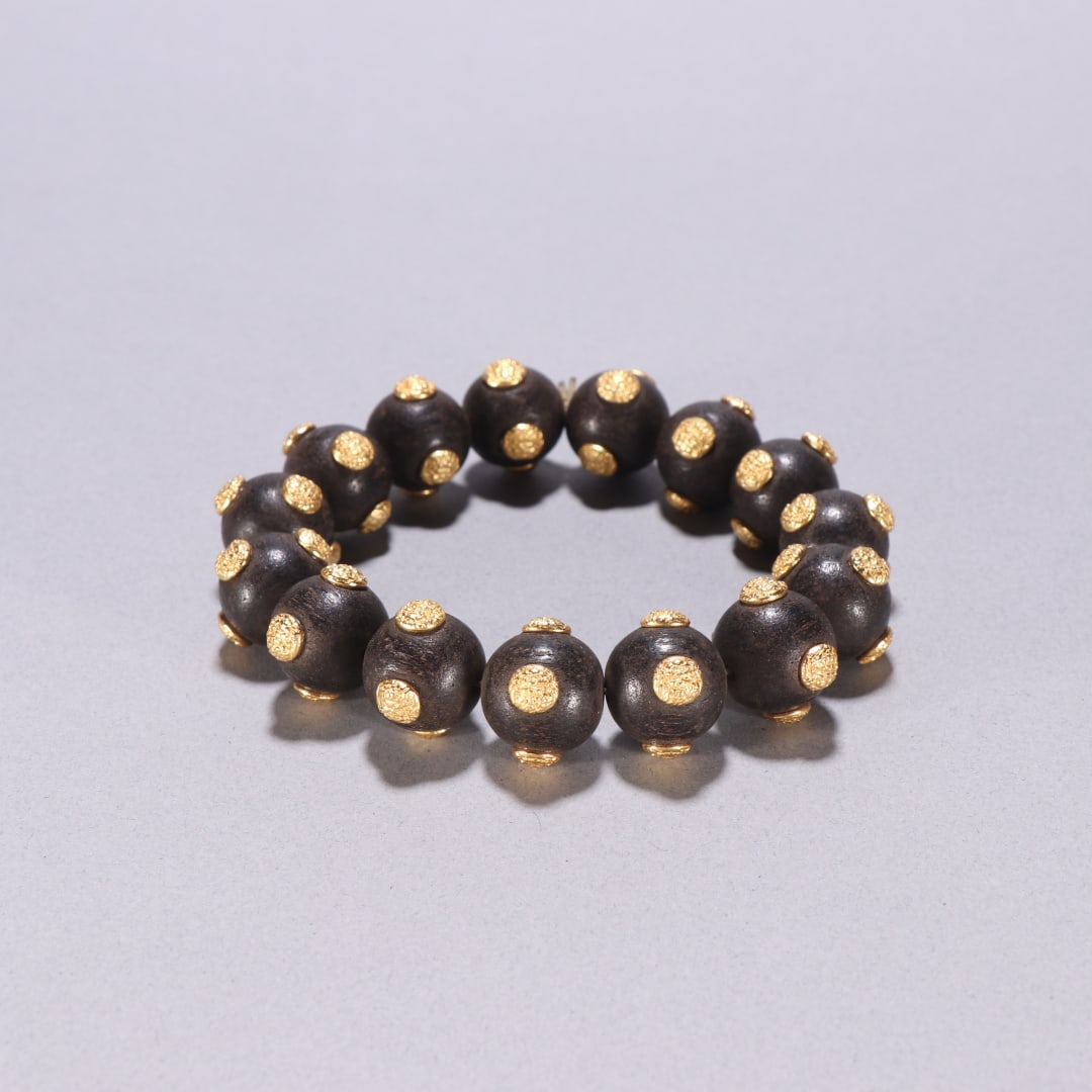 A beautiful agarwood inlaid silver gilt bracelet (1 of 9)