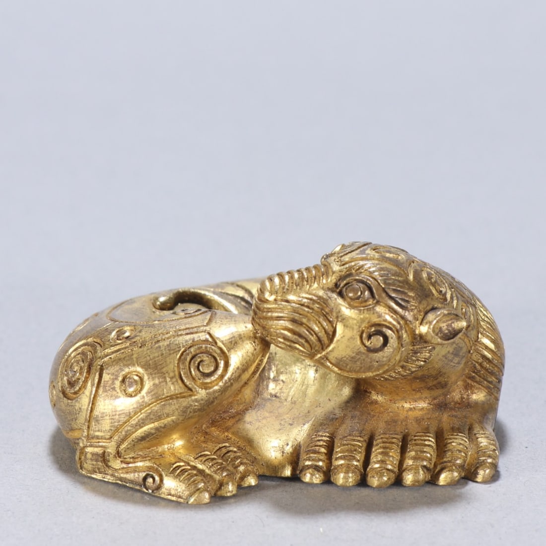 A finely crafted gilt bronze beast ornament (1 of 9)