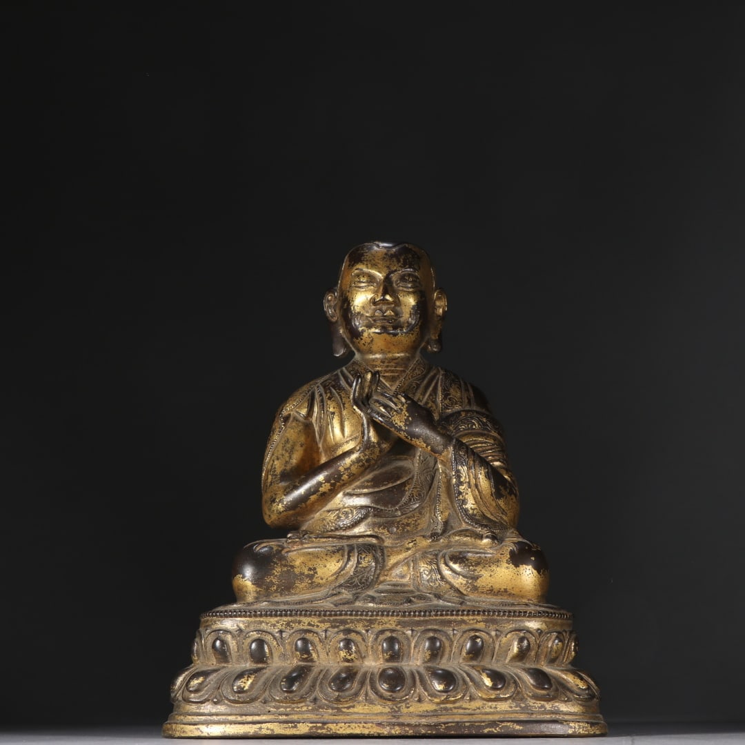 A Qing Dynasty gilt bronze statue of the Guru Buddha (1 of 9)
