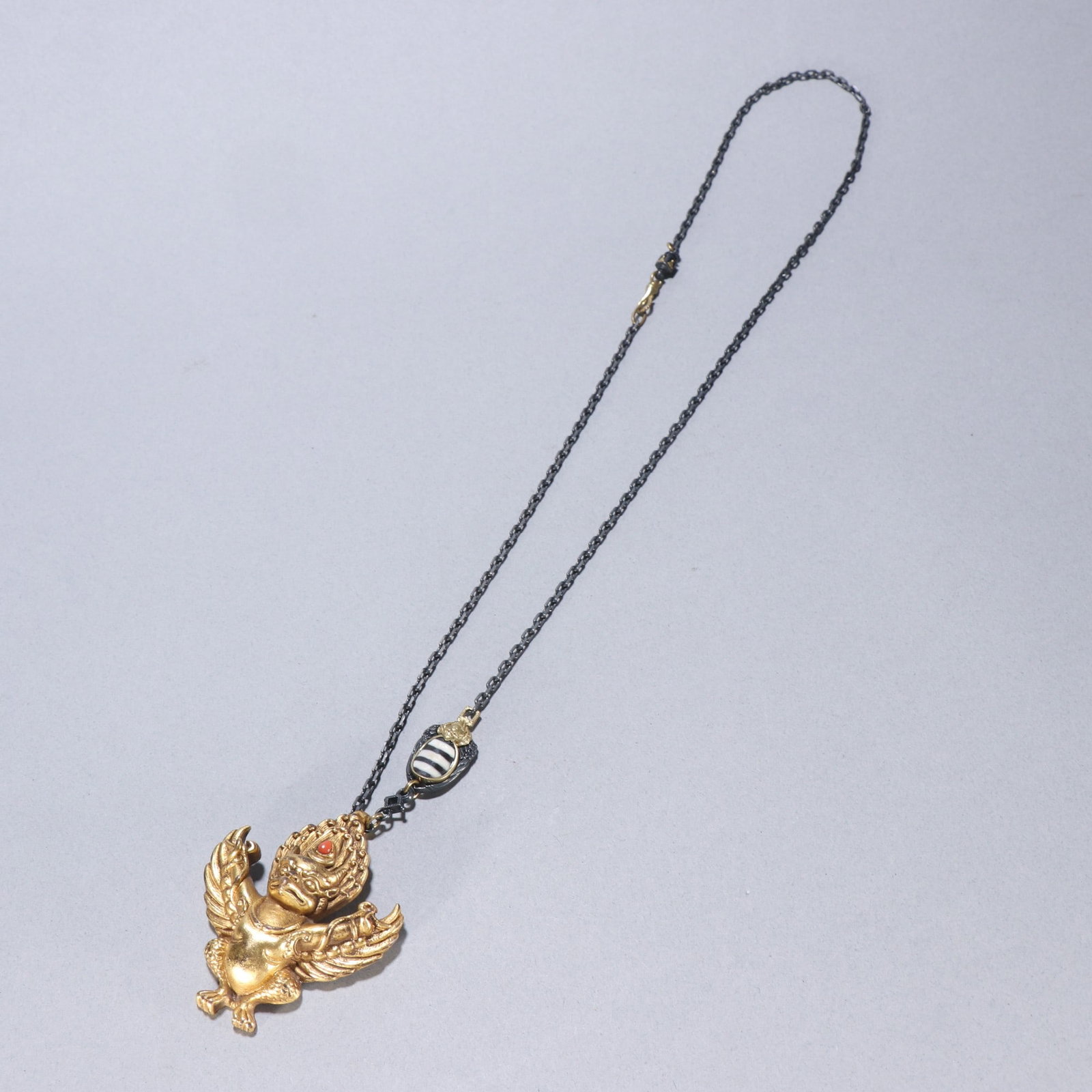 A beautifully gilted bronze roc pendant (1 of 9)