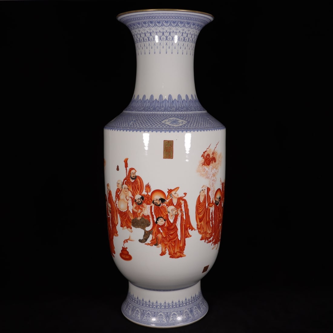 A Qing Dynasty Qianlong period enamel red eighteen arhats golden bell vase (1 of 10)