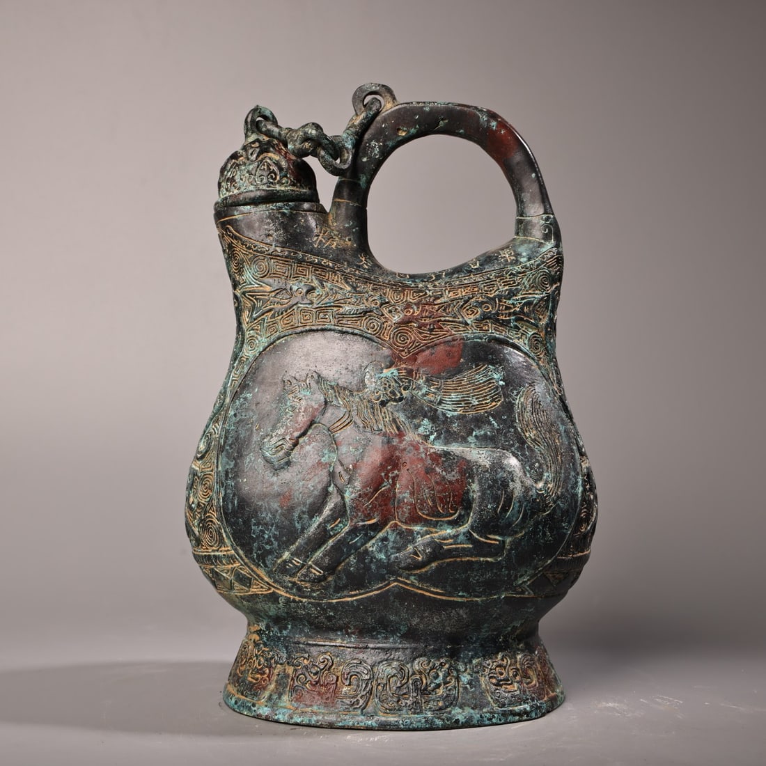 A finely crafted inscribed bronze horse pot (1 of 8)