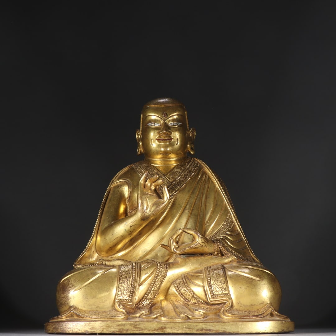 A finely crafted gild bronze statue of the Guru Buddha (1 of 9)