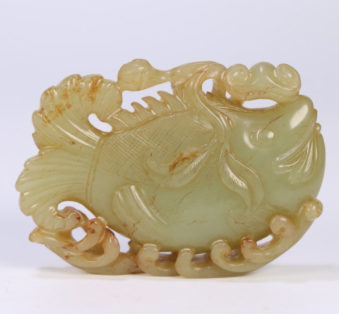 A Qing Dynasty Hetian Huangyu Lotus Fish Ornament (1 of 8)