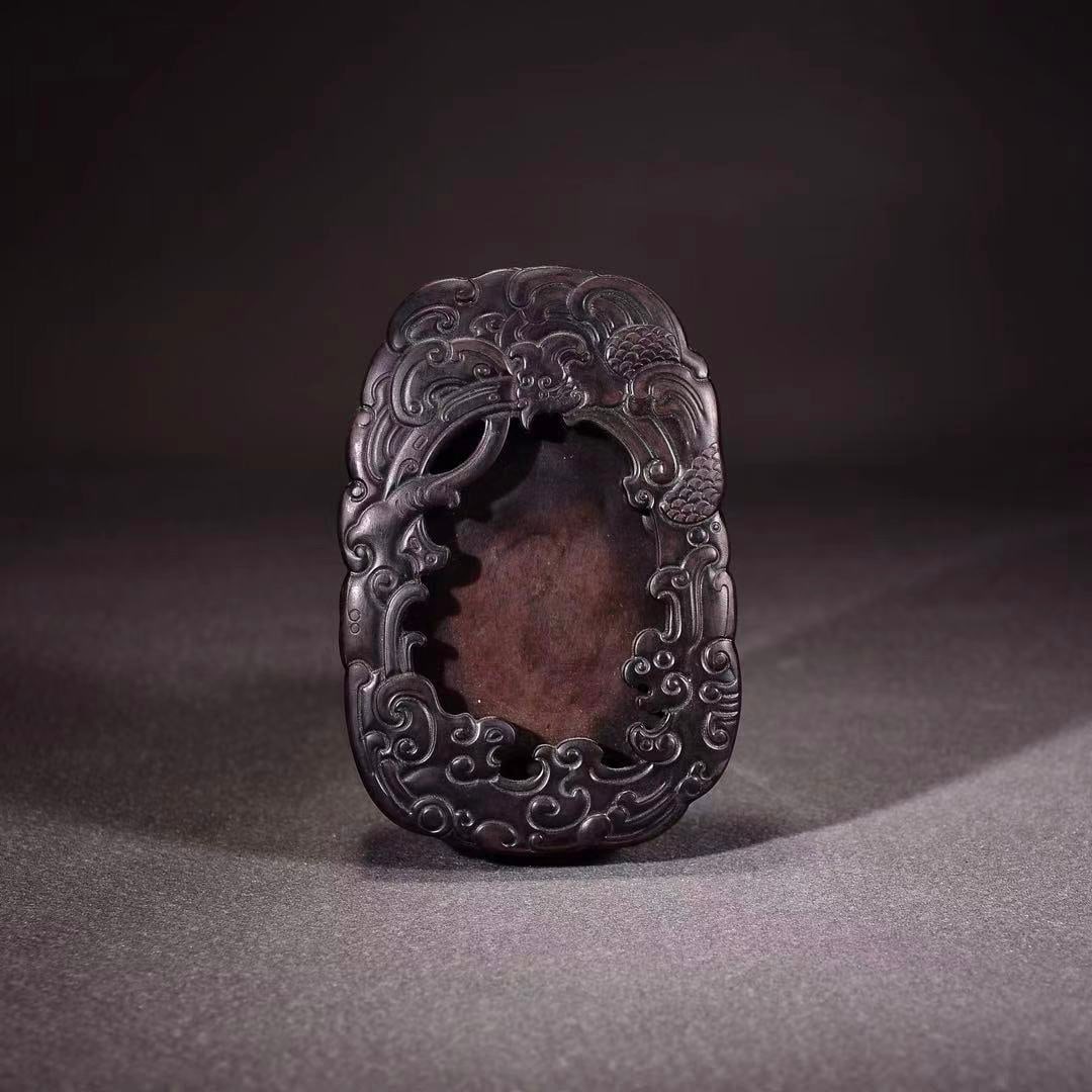 A finely crafted hollowed-out cloud and dragon motif for the end inkstone and sleeve of the inkstone (1 of 8)