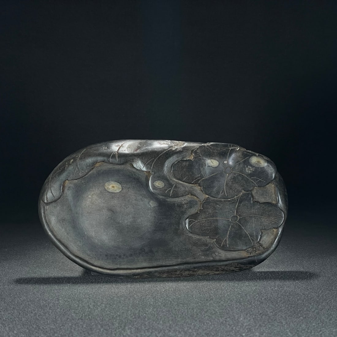 A finely crafted Plum Blossom Pit Lotus Charm Duan Inkstone: Exquisite plum blossom pit lotus charm Duan inkstone Size:24.2x13x2.6cm W: 1.692 kg Size:24.2x13x2.6cm W: 1.692 kg (The Dimensions Of All Batches Are Manually Measured.If You Need More Detailed Inform