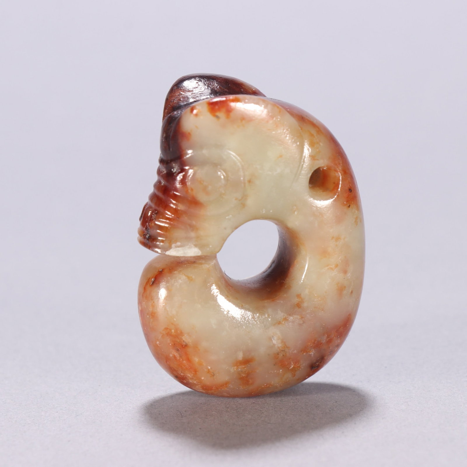 A beautiful Hongshan culture river-milled jade pig dragon (1 of 9)