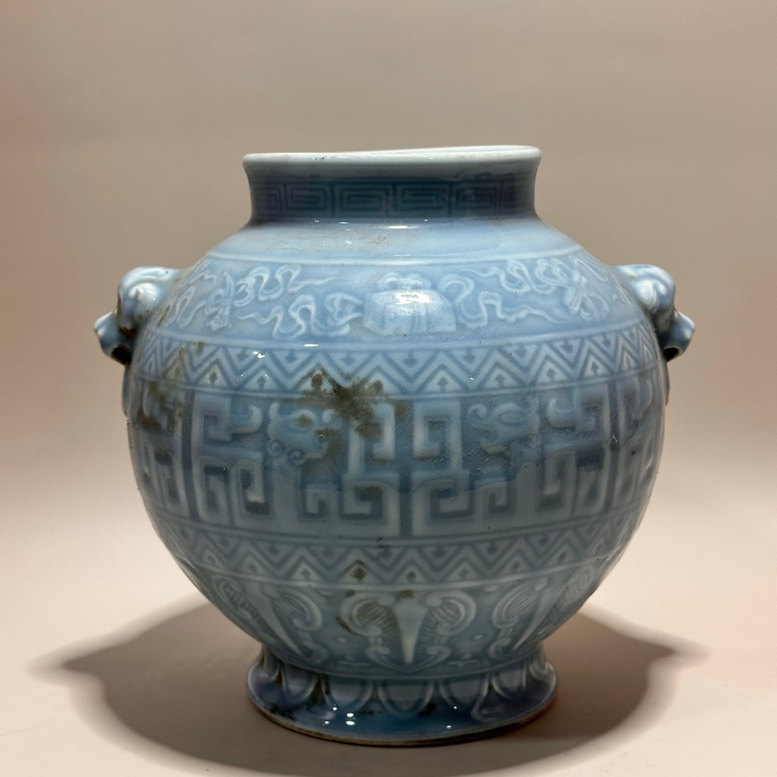 A sky-blue glazed beast-handle jar made during the Qianlong period of the Qing Dynasty: A sky-blue glazed beast-ear jar made during the Qianlong period of the Qing Dynasty Size: H: 12.1cm Calibre 11.7cm Belly diameter: 24cm bottom 12.8cm Size: H: 12.1cm Calibre 11.7cm Belly diameter: 24c