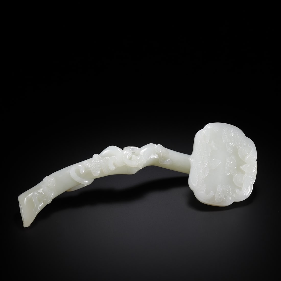 A beautiful Hetian jade ruyi with longevity mountain and sea dragon patterns: Exquisite Hetian jade longevity mountain blessing sea dragon pattern Size:21x7.5x4.0 cm W:0.2665 kg Size:21x7.5x4.0 cm W:0.2665 kg (The Dimensions Of All Batches Are Manually Measured.If You Need More