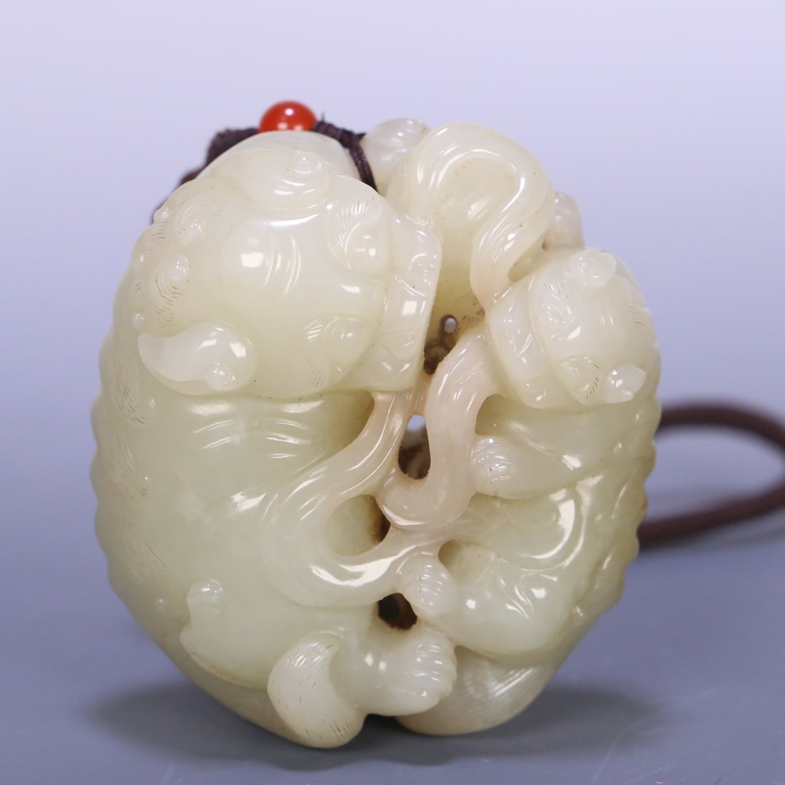 A Qing Dynasty Hetian jade jade with two lion dances featuring embroidered balls: Qing Dynasty Hetian jade double lions playing with embroidered balls Size:7x6.5x3.5 cm W: 0.2192 kg Size:7x6.5x3.5 cm W: 0.2192 kg (The Dimensions Of All Batches Are Manually Measured.If You Need