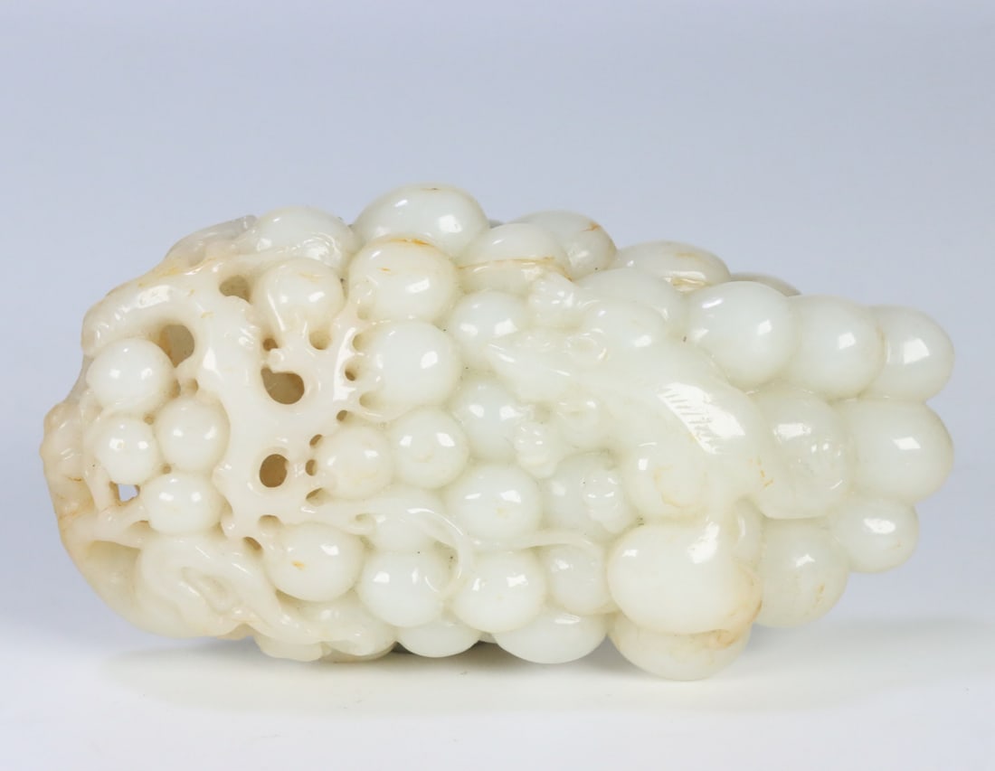 A Qing Dynasty Hetian jade squirrel grape handle (1 of 9)
