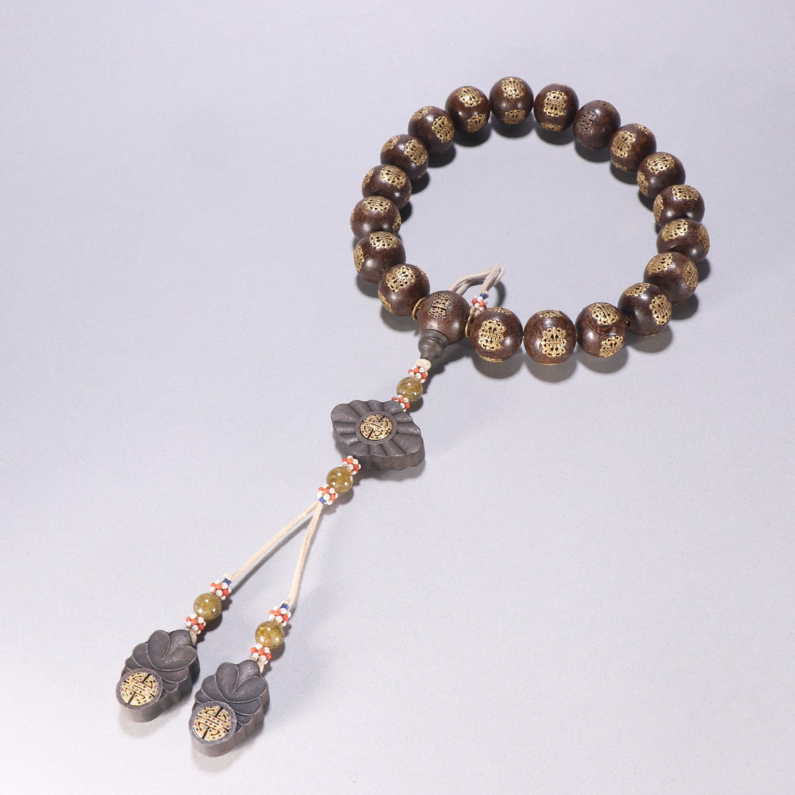 A Qing Dynasty agarwood inlaid with silver and gilded longevity character pattern, eighteen sons in (1 of 9)
