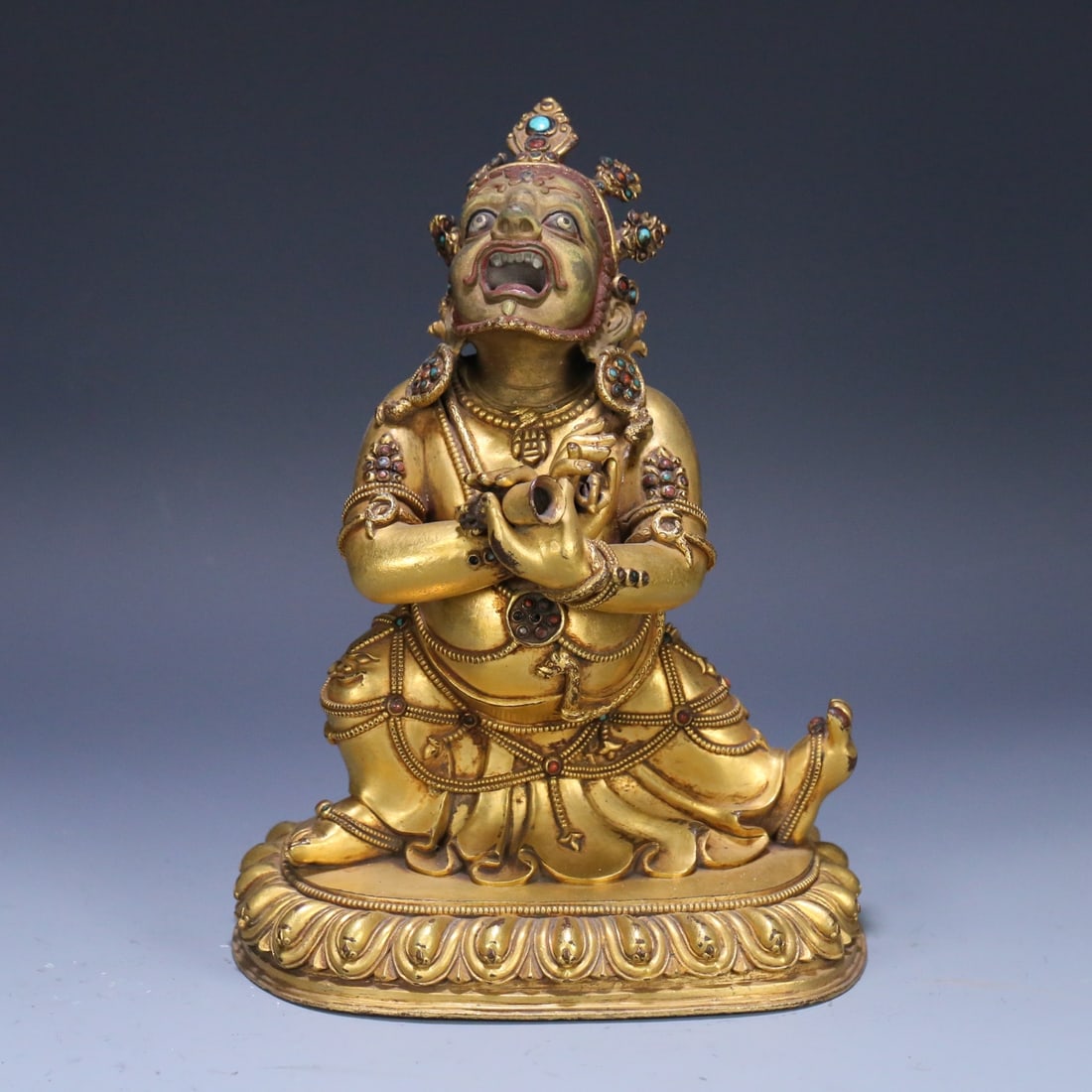A Ming Dynasty gilded bronze Vajra guardian statue (1 of 9)