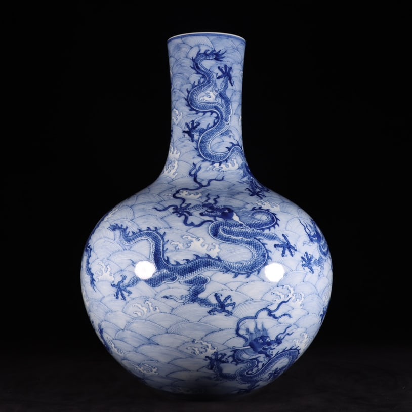 A blue-and-white seawater nine-dragon celestial globe vase made during the Qianlong period of the (1 of 7)
