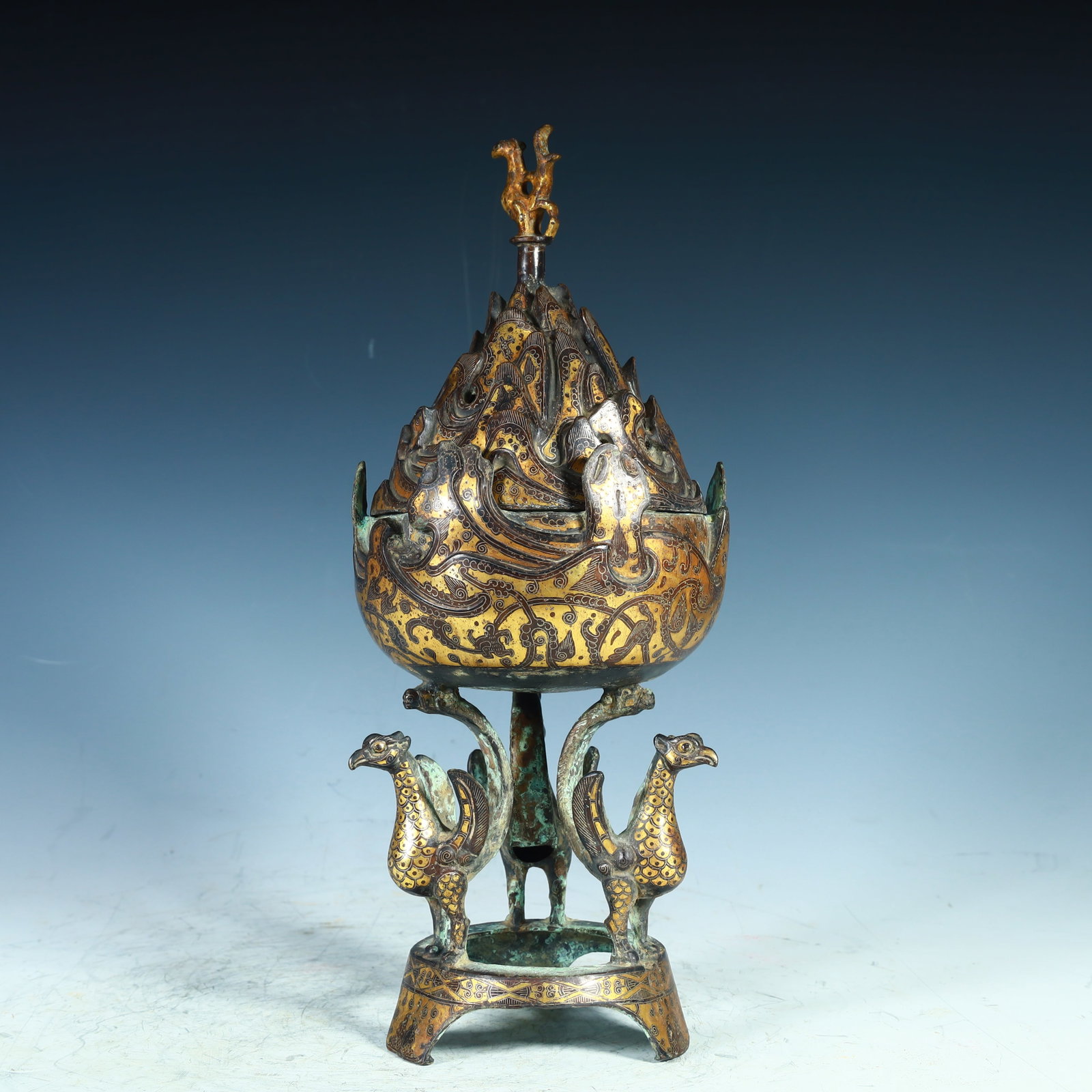 A Han Dynasty gold and silver Boshan censer: The Han dynasty gold and silver Boshan censer SIZE: H:34cm L: 13cm W:2kg SIZE: H:34cm L: 13cm W:2kg (The Dimensions Of All Batches Are Manually Measured.If You Need More Detailed Information, Please C