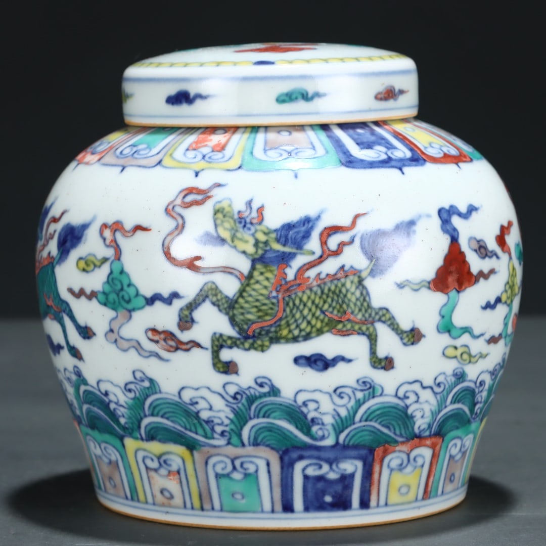 A Ming Dynasty Chenghua period jar with a doucai sea water auspicious beast pattern and the (1 of 7)