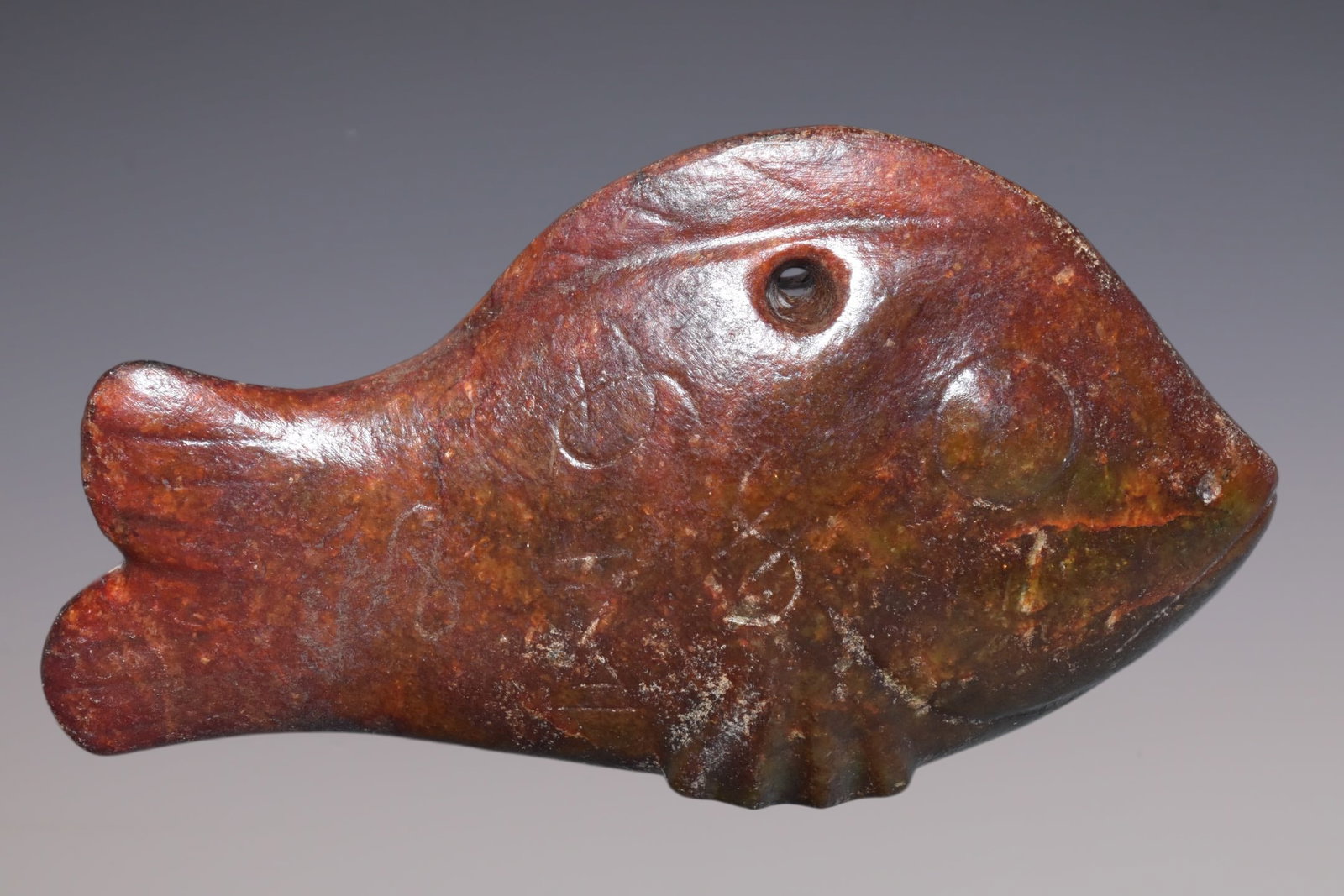 An Exquisite Hemo Jade Fish: An Exquisite Hemo Jade Fish Hong Shan Culture Size:9cmx14.5cm Weight:450g (The Dimensions Of All Batches Are Manually Measured.If You Need More Detailed Information, Please Contact Our Customer Servic