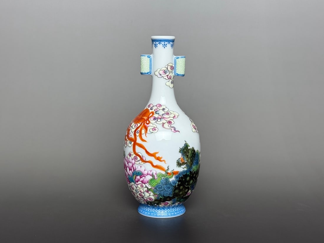An Exquisite Famille-Rose Lion Pattern Double-Ears Vase: An Exquisite Famille-Rose Lion Pattern Double-Ears Vase Qing Dynasty, China Yongzheng Four-character Mark Size:15.7cmx7cm (The Dimensions Of All Batches Are Manually Measured.If You Need More