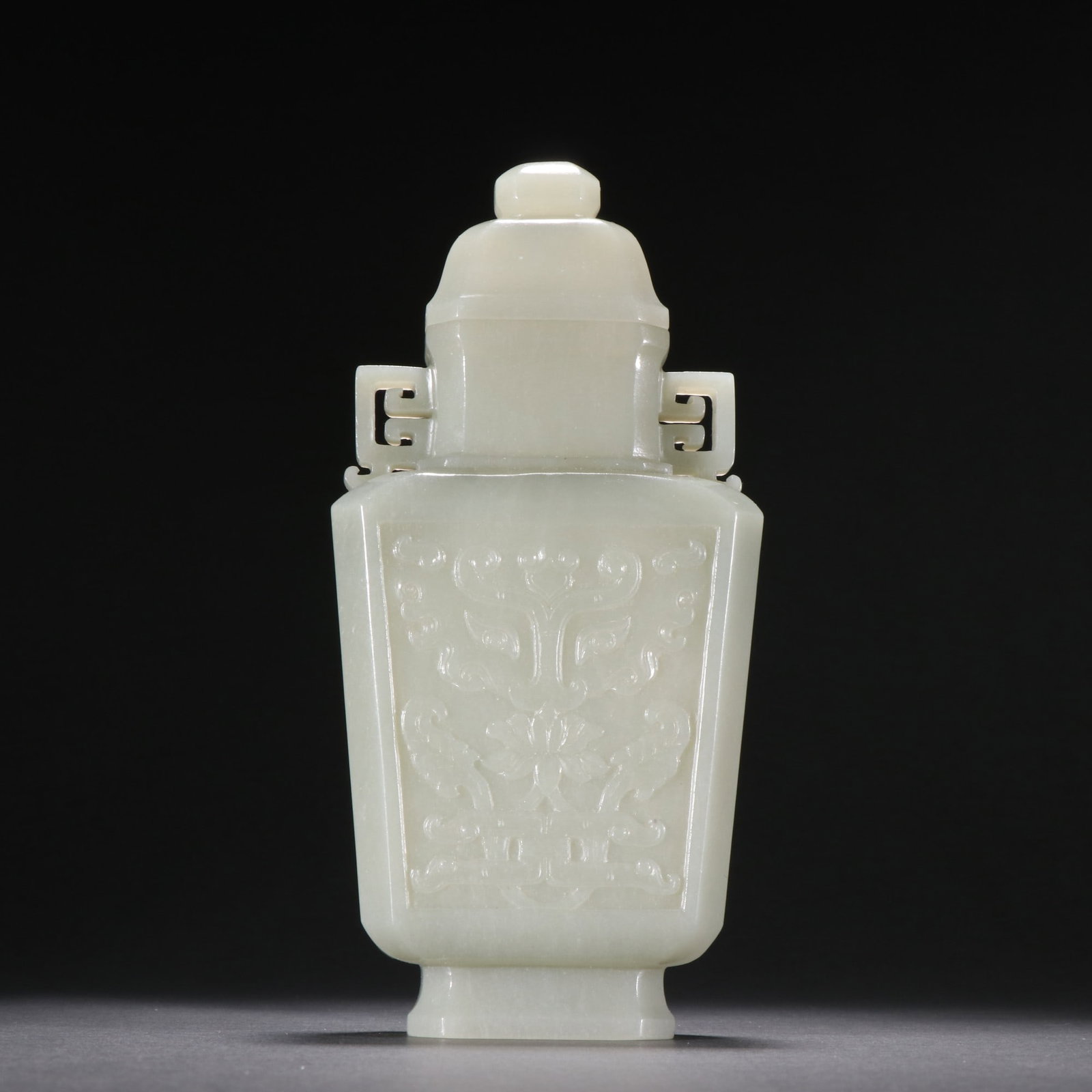 An Exquisite White Jade Beast-Face Pattern Double-Ears Vase: An Exquisite White Jade Beast-Face Pattern Double-Ears Vase Qing Dynasty, China Size:17cmx8cm Weight:348g (The Dimensions Of All Batches Are Manually Measured.If You Need More Detailed Information, Pl