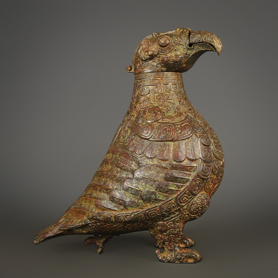 A Western Zhou bronze full-work hawk-beak zun: Western Zhou bronze full-work eagle-beak bird zun Size: L: 22cm H: 25cm W: 2.35kg (The Dimensions Of All Batches Are Manually Measured.If You Need More Detailed Information, Please Contact Our Custome