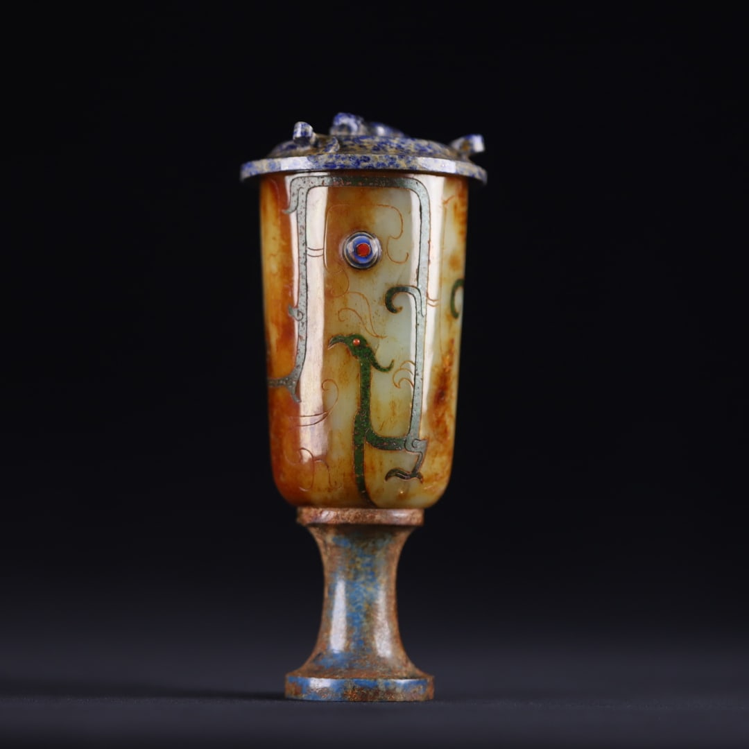 A beautiful ancient jade football cup with lid: Exquisite ancient jade stemmed cup with lid Size: H: 14.5cm Calibre: 5.0cm W: 0.33 kg (The Dimensions Of All Batches Are Manually Measured.If You Need More Detailed Information, Please Contact Our Cus
