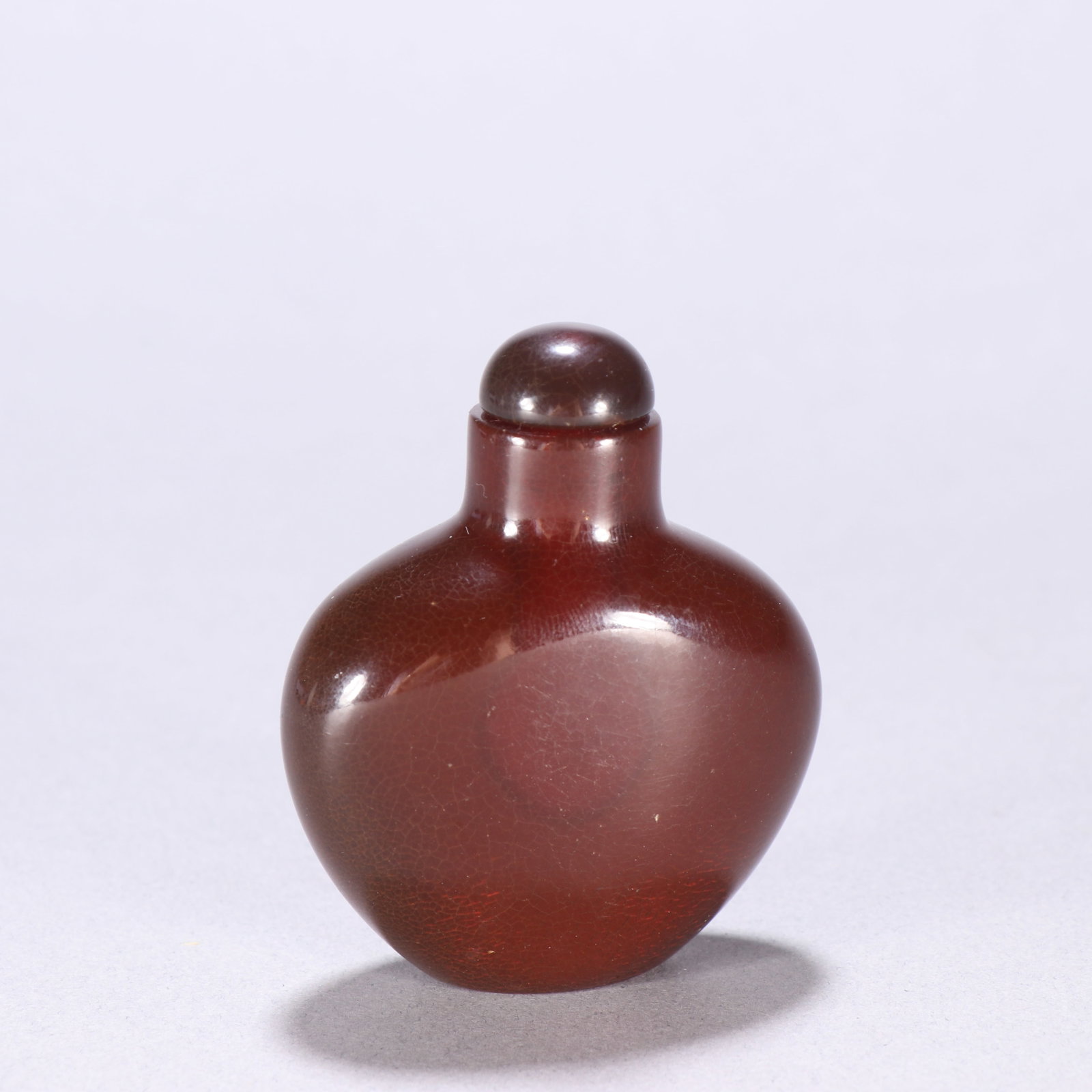 A Qing Dynasty amber snuff bottle (1 of 9)