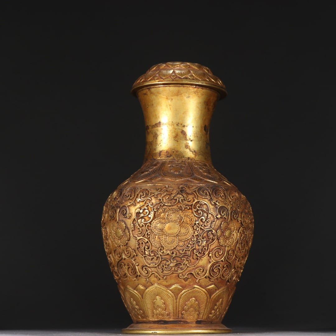 A Liao Dynasty copper gilt entwined floral vase: Liao Dynasty bronze gilt entwined floral vase Size: H: 17.5cm W: 9.3cm W: 0.4528 kg (The Dimensions Of All Batches Are Manually Measured.If You Need More Detailed Information, Please Contact Our Custo