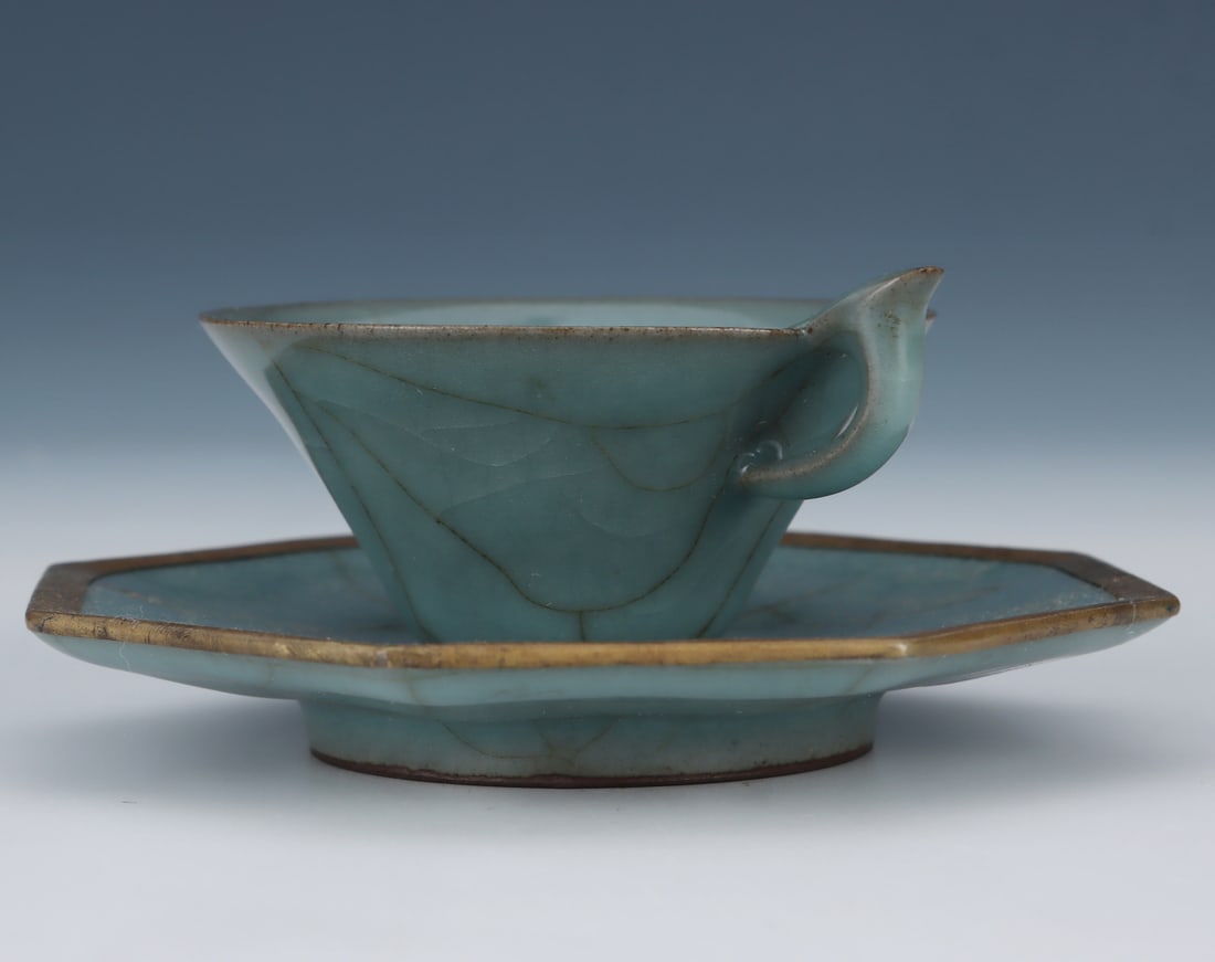 A powder-green glazed cup stand from the Song Dynasty official kiln (1 of 8)