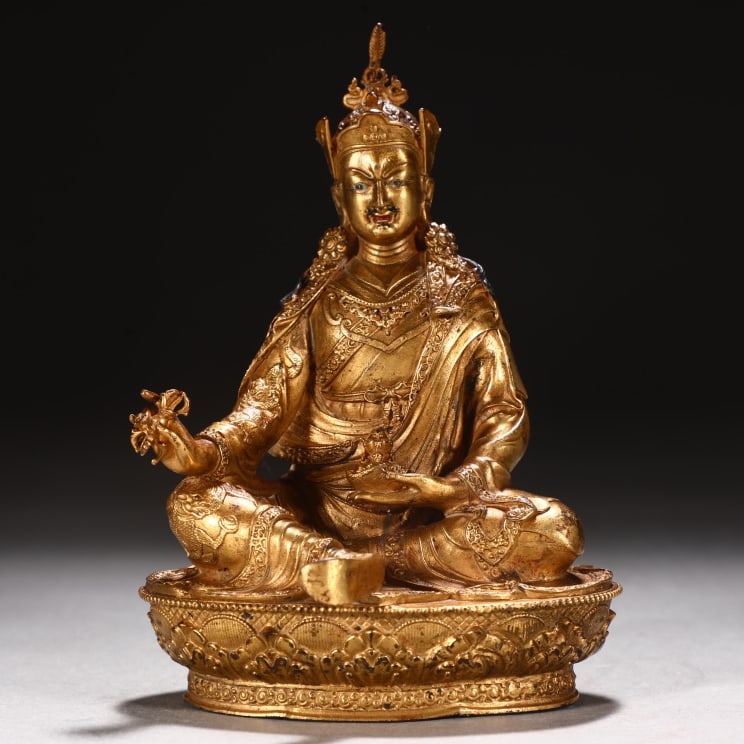 A Ming Dynasty finely cast gilded bronze statue of Master Lotus and Peanut: A finely cast gilded statue of Master Lotus and Peanut from the Ming Dynasty Size: H:16cm W:11cm W: 0.85 kg (The Dimensions Of All Batches Are Manually Measured.If You Need More Detailed Information, 