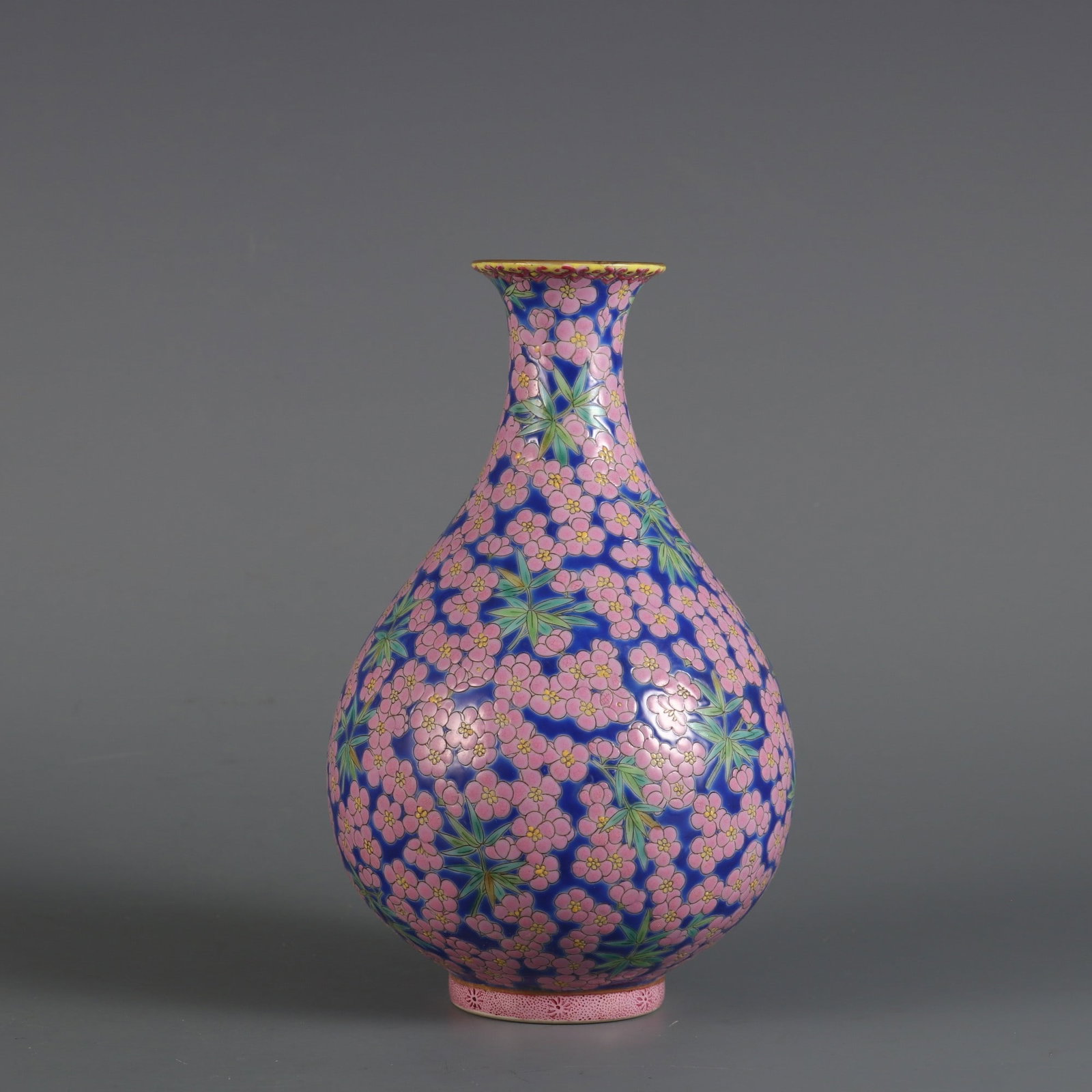 A blue-ground famille rose plum and bamboo jade spring vase made during the Qianlong period of the: A blue-ground famille rose plum and bamboo jade spring vase made during the Qianlong period of the Qing Dynasty Size: H: 17.8cmBelly diameter: 10.5cmCalibre: 4.5cm (The Dimensions Of All Batches Are M