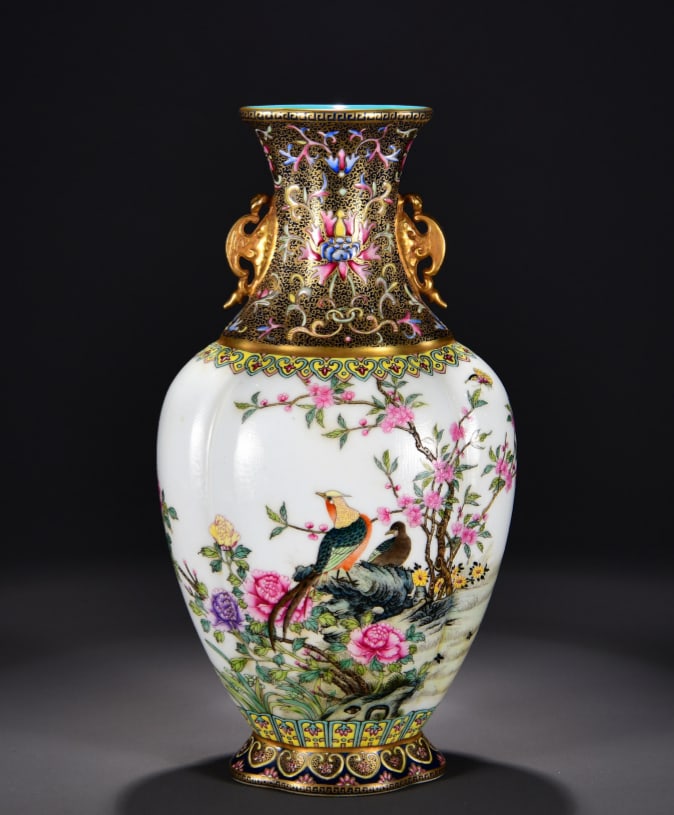 A famille rose brocade 'Wealth and Honor' poem and prose gilded double-handled vase from the: A famille rose brocade and wealthy painting with gilded double-handled two-handled vases made during the Yongzheng period of the Qing Dynasty Size: H: 36cmD:19cm (The Dimensions Of All Batches Are Man