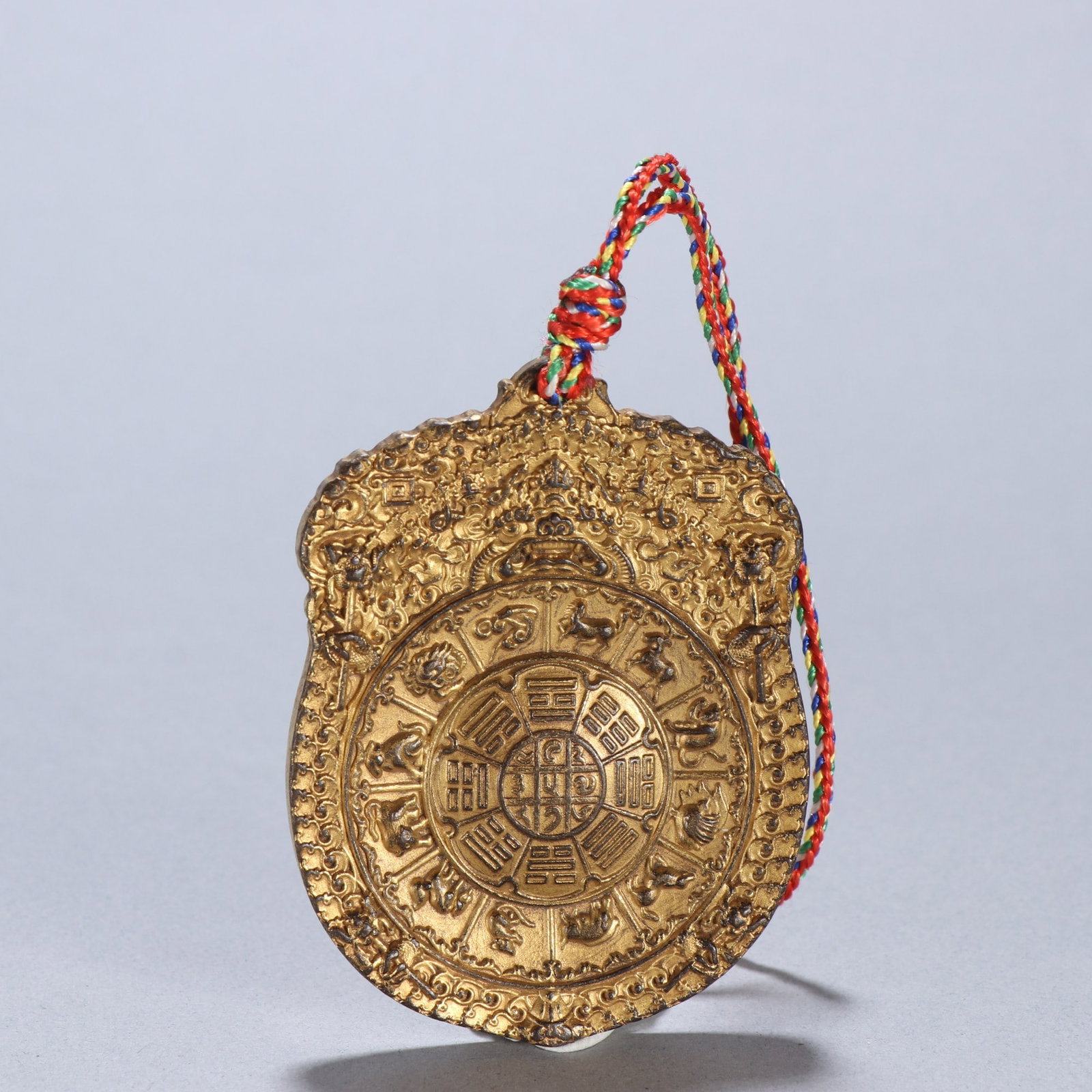 A finely crafted gilt copper nine-palace Bagua plaque: Exquisite gilt copper nine-palace Bagua plaque Size: H: 7.8cm W: 5.8cm W: 0.1311 kg (The Dimensions Of All Batches Are Manually Measured.If You Need More Detailed Information, Please Contact Our Custo