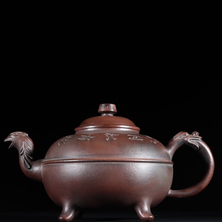 A Qing Dynasty Jurentang Dragon and Phoenix Auspicious Waistline Teapot (1 of 9)