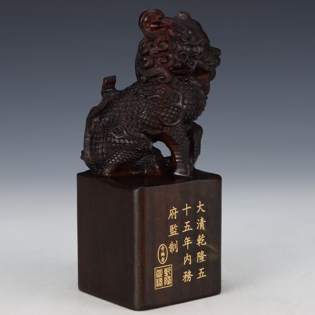 A Qing Dynasty agarwood seal, gazing up at the Eight Treasures of Long Cry, a treasure of rare: Qing dynasty agarwood seals gaze up at the treasures of the Eight Treasures and the Hidden Thoughts Size: L: 6 cmW:6 cmH:14.8 cm (The Dimensions Of All Batches Are Manually Measured.If You Need More D