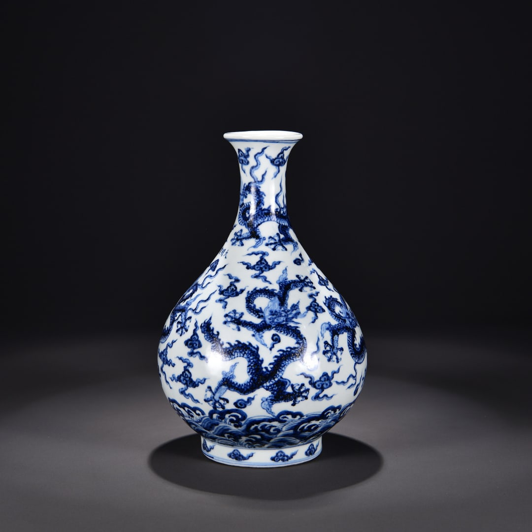 A Ming Dynasty Xuande period jade bottle with sea water cloud and dragon motif jade pot spring vase (1 of 8)