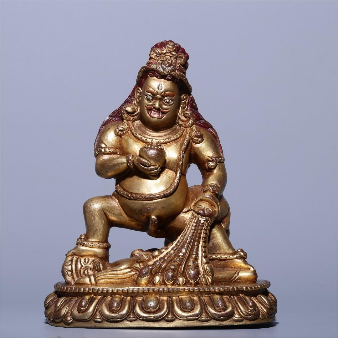 A Qing Dynasty bronze gilt black statue of the God of Wealth: A bronze gilt black statue of the God of Wealth from the Qing Dynasty Size:H:15cm L:12cm W:6.3cm W:1.311kg (The Dimensions Of All Batches Are Manually Measured.If You Need More Detailed Information, P