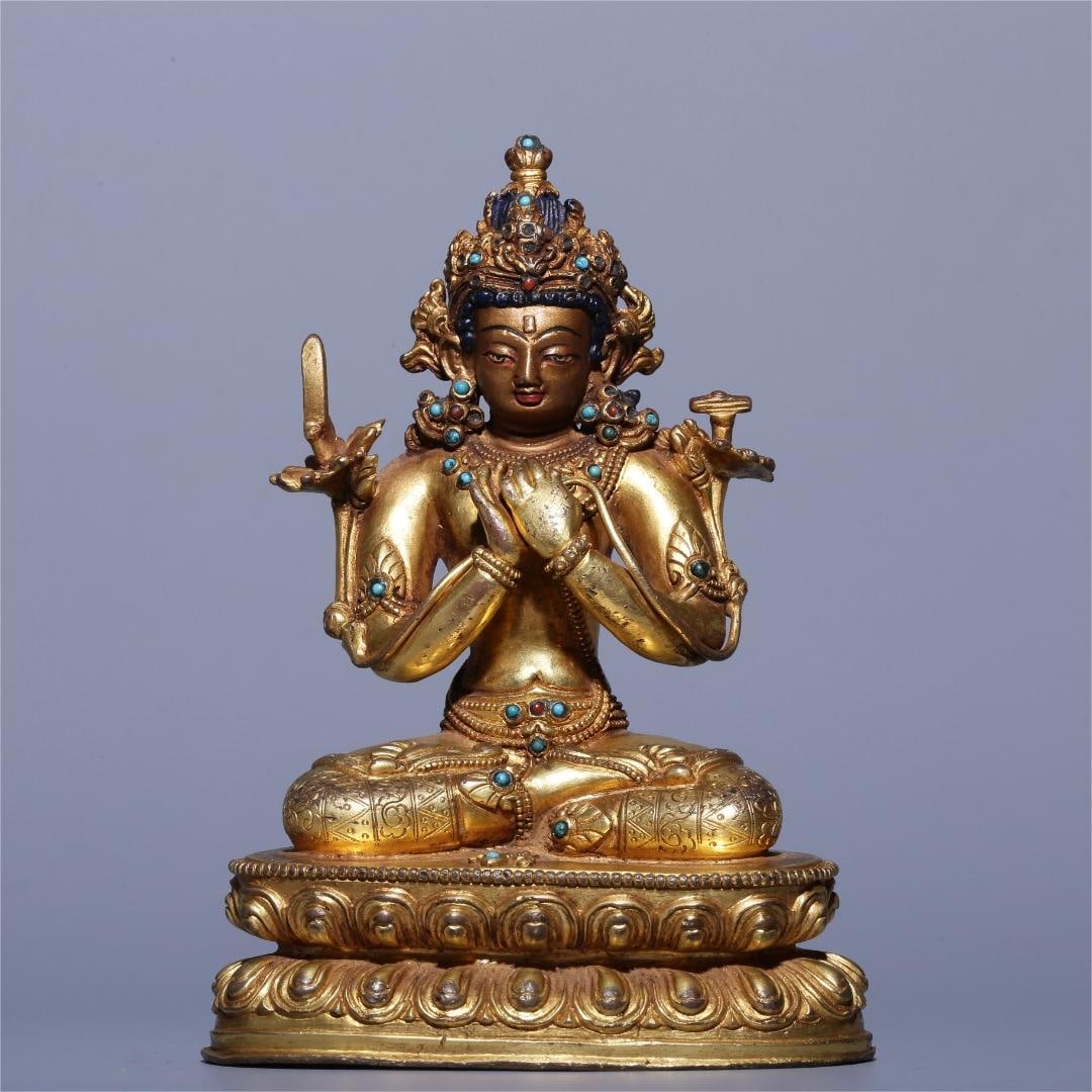 A Qing Dynasty gilded bronze inlaid turquoise statue of Manjushri Bodhisattva: A Qing Dynasty gilded bronze inlaid turquoise statue of Manjushri Bodhisattva Size:H:15cm L:10.3cm W:6.3cm W:0.924kg (The Dimensions Of All Batches Are Manually Measured.If You Need More Detailed Info