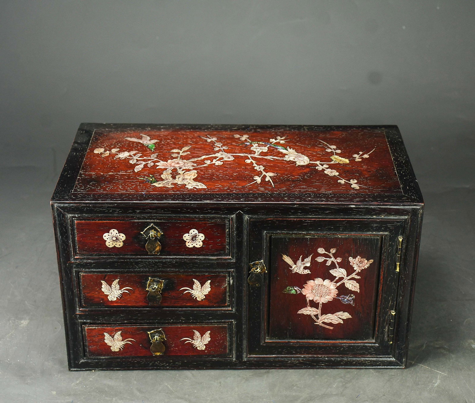 A beautiful rosewood jewelry cabinet with inlaid shells (1 of 9)