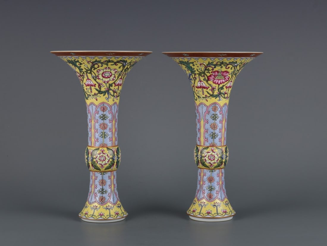 A pair of yellow-ground famille rose banana leaf lotus flower goblets from the Qing Dynasty (1 of 9)