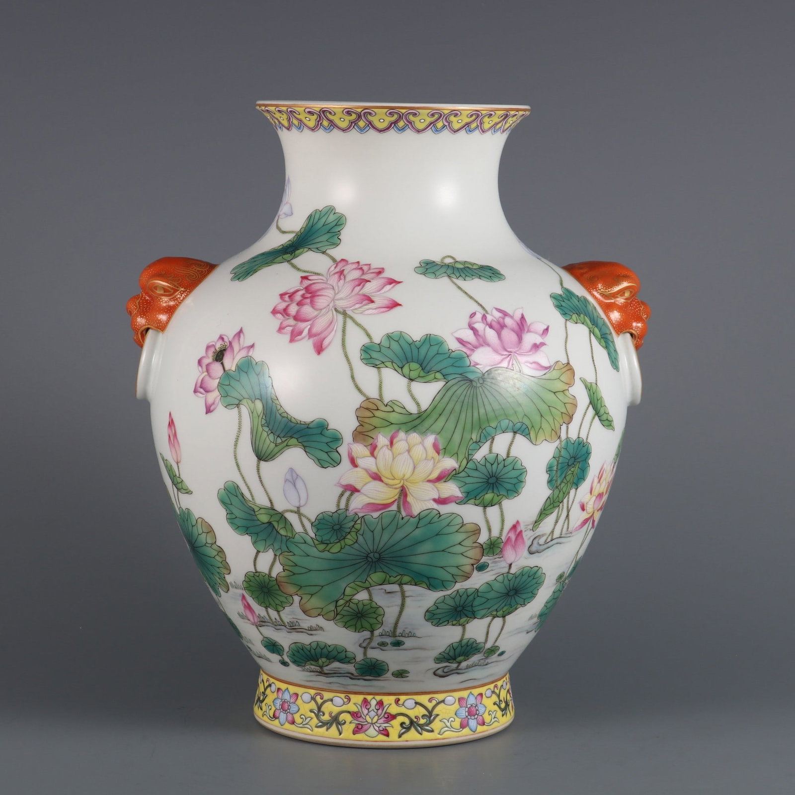 A Qing Dynasty famille rose lotus pattern, beast-eared Arhat wine vase: Qing Dynasty famille rose lotus pattern, beast-eared Arhat wine vase Size:H:26.8cm Calibre:11.2cm Belly diameter:19cm (The Dimensions Of All Batches Are Manually Measured.If You Need More Detailed Inf