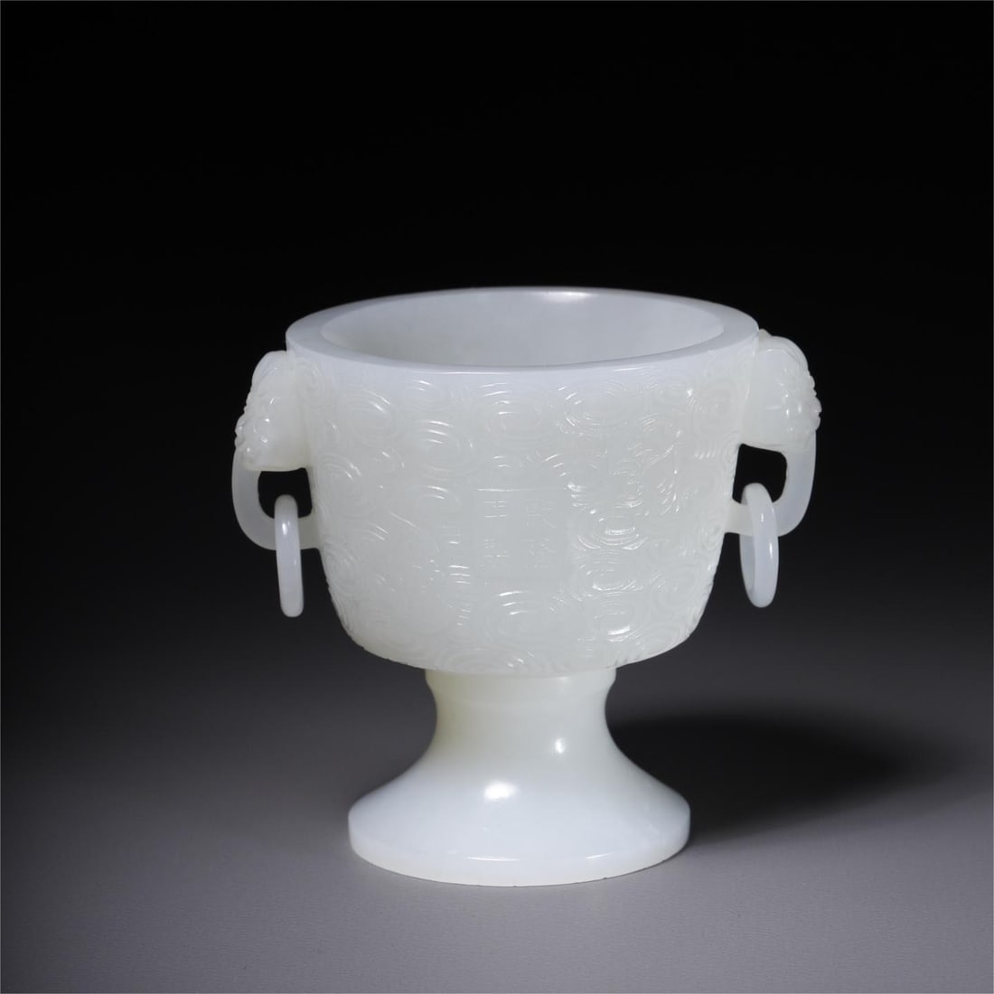A beautiful Hetian white jade double-handled cup: Exquisite Hetian white jade double-handled cup Size:6.7x5.5x6.2cm W:0.1366kg (The Dimensions Of All Batches Are Manually Measured.If You Need More Detailed Information, Please Contact Our Customer Ser