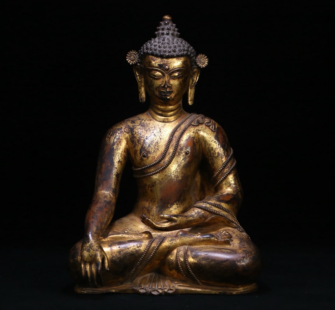 A finely crafted gilt bronze statue of Shakyamuni Buddha (1 of 9)