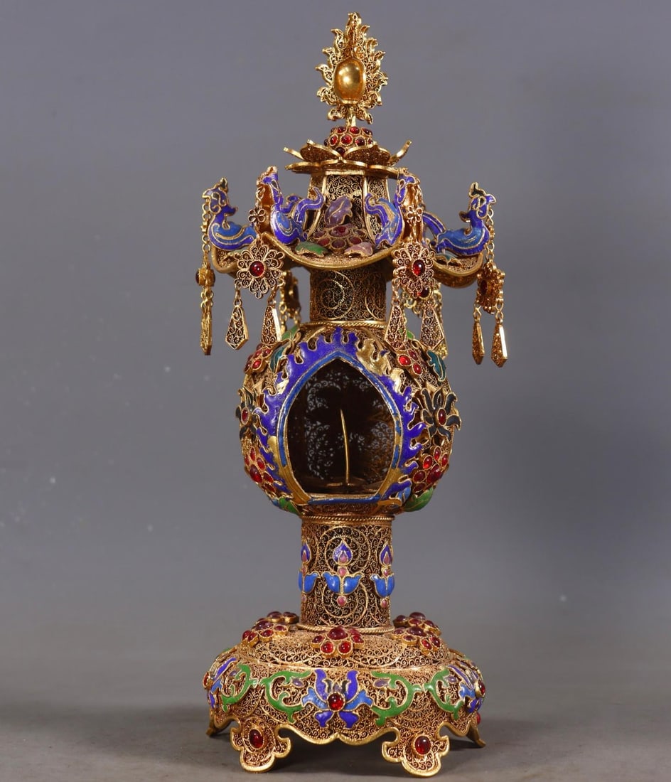 A filigree gilded gemstone pagoda from the Qing Dynasty: A filigree gilded gemstone pagoda from the Qing Dynasty Size:H:26.5cm D:10.5cm W:0.603kg (The Dimensions Of All Batches Are Manually Measured.If You Need More Detailed Information, Please Contact Our 