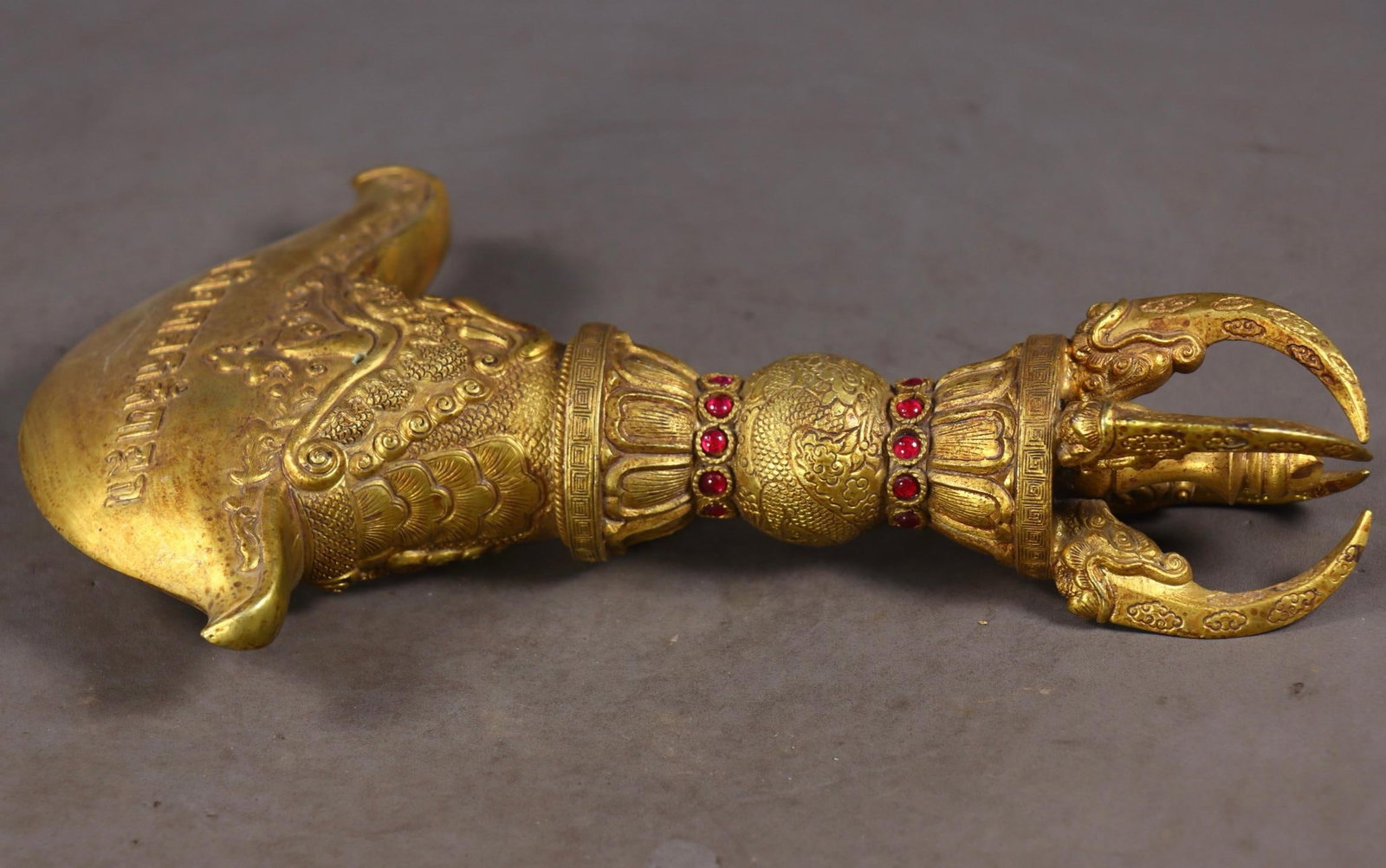 A beautifully crafted bronze gilded gem-inlaid demon-subduing pestle (1 of 9)